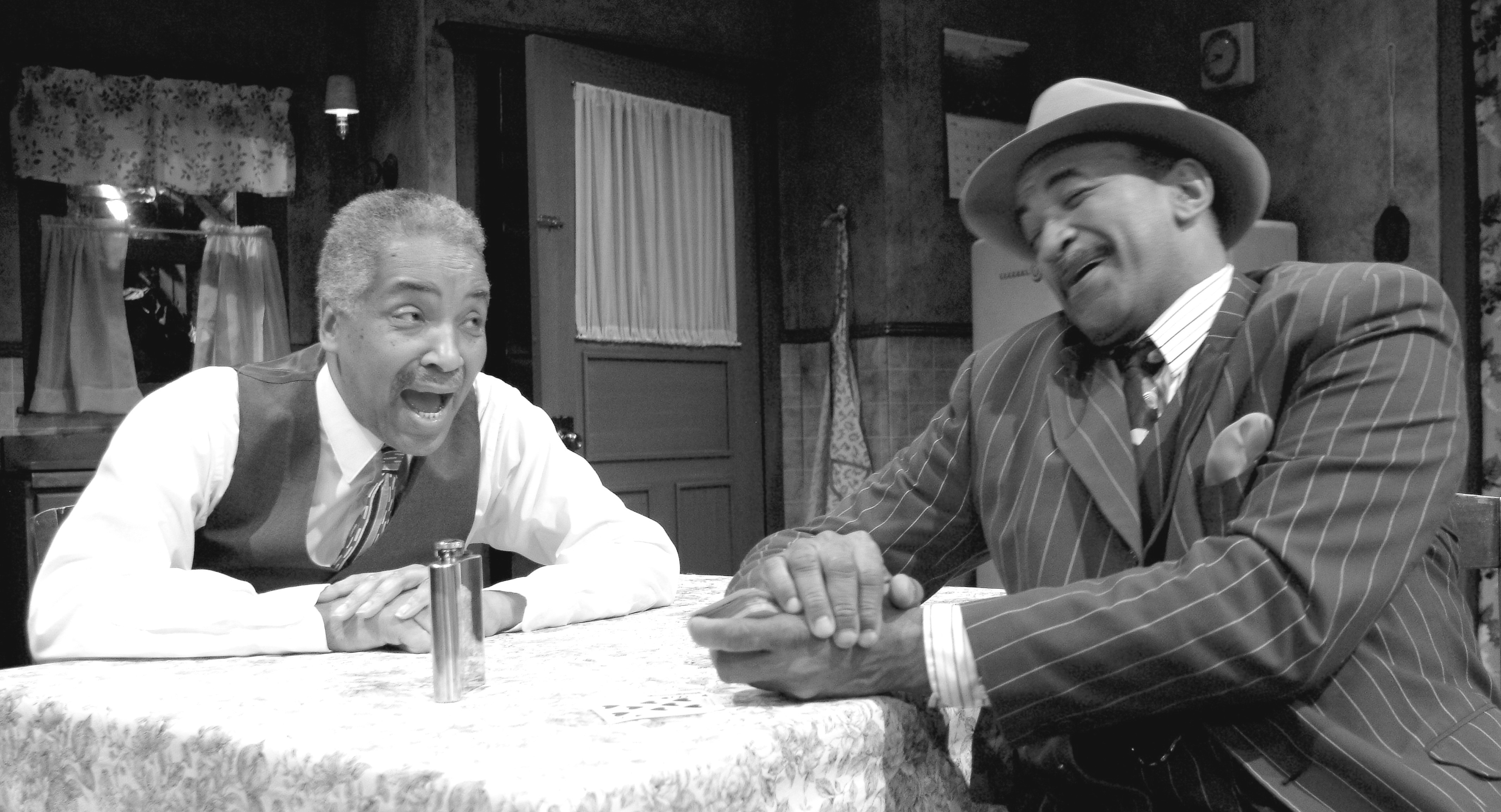 Council Cargile as Doaker and Herman McCain as Wining Boy in Plowshares' production of The Piano Lesson
